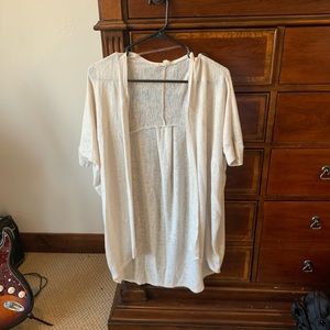 Barely warn shawl top